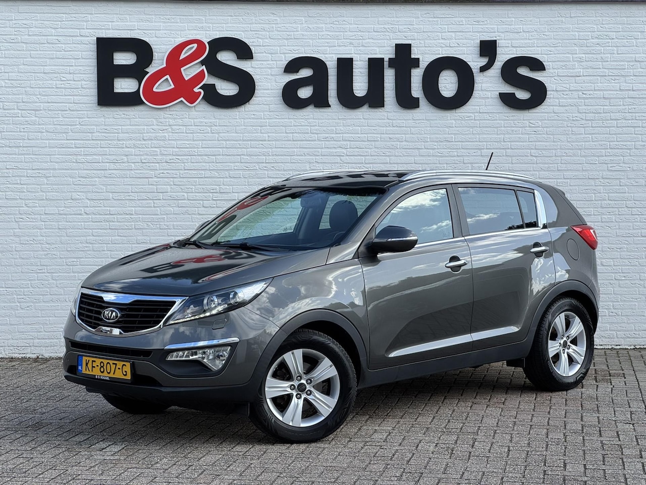 Kia Sportage - 1.6 X-clusive leder navi camera parksensoren achter - AutoWereld.nl