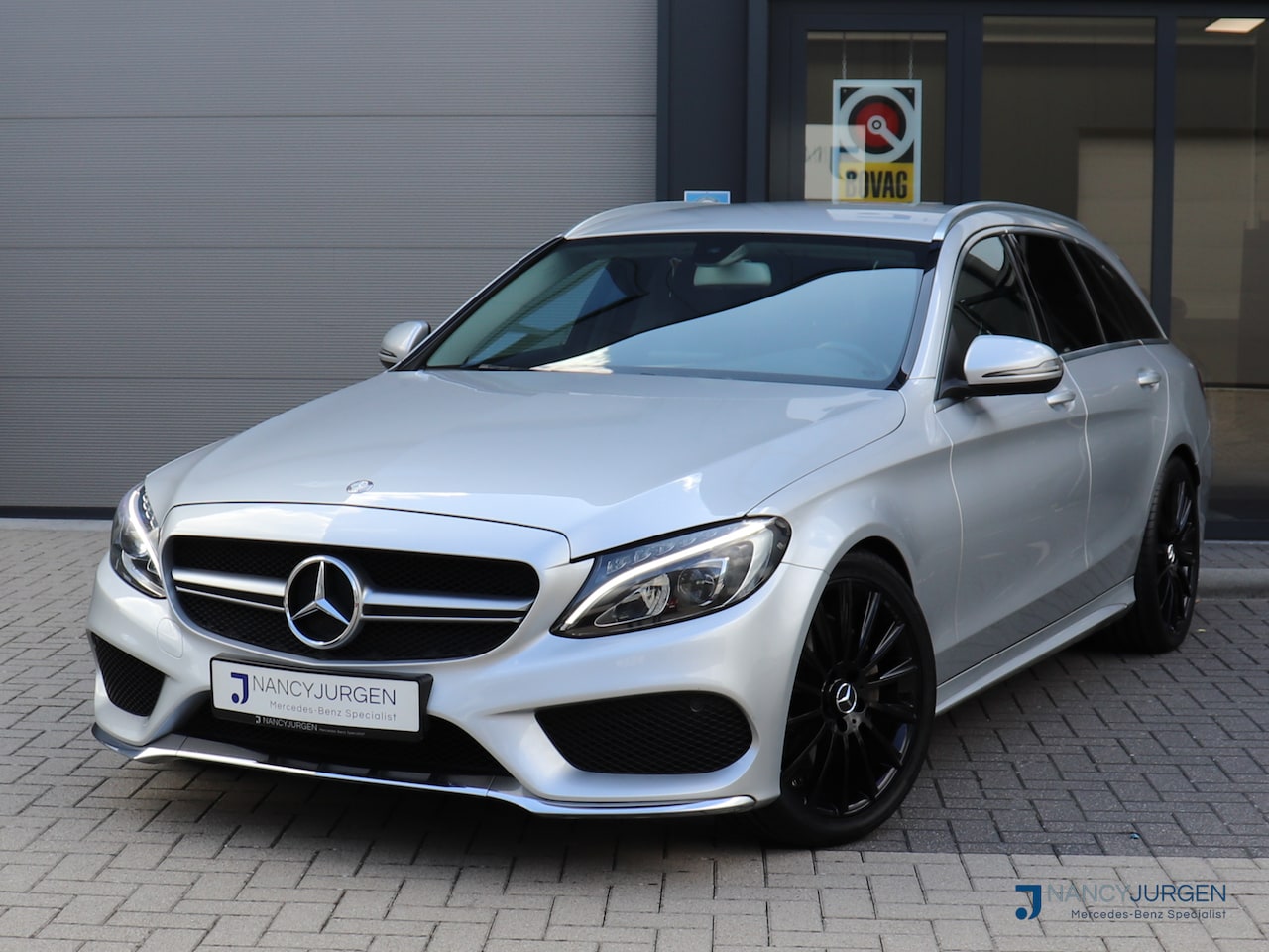 Mercedes-Benz C-klasse Estate - 200 AMG | 7G Aut | Airco | Leder | Navi | 19" LM AMG Velgen | Elektr. Achterklep | Spiegel - AutoWereld.nl