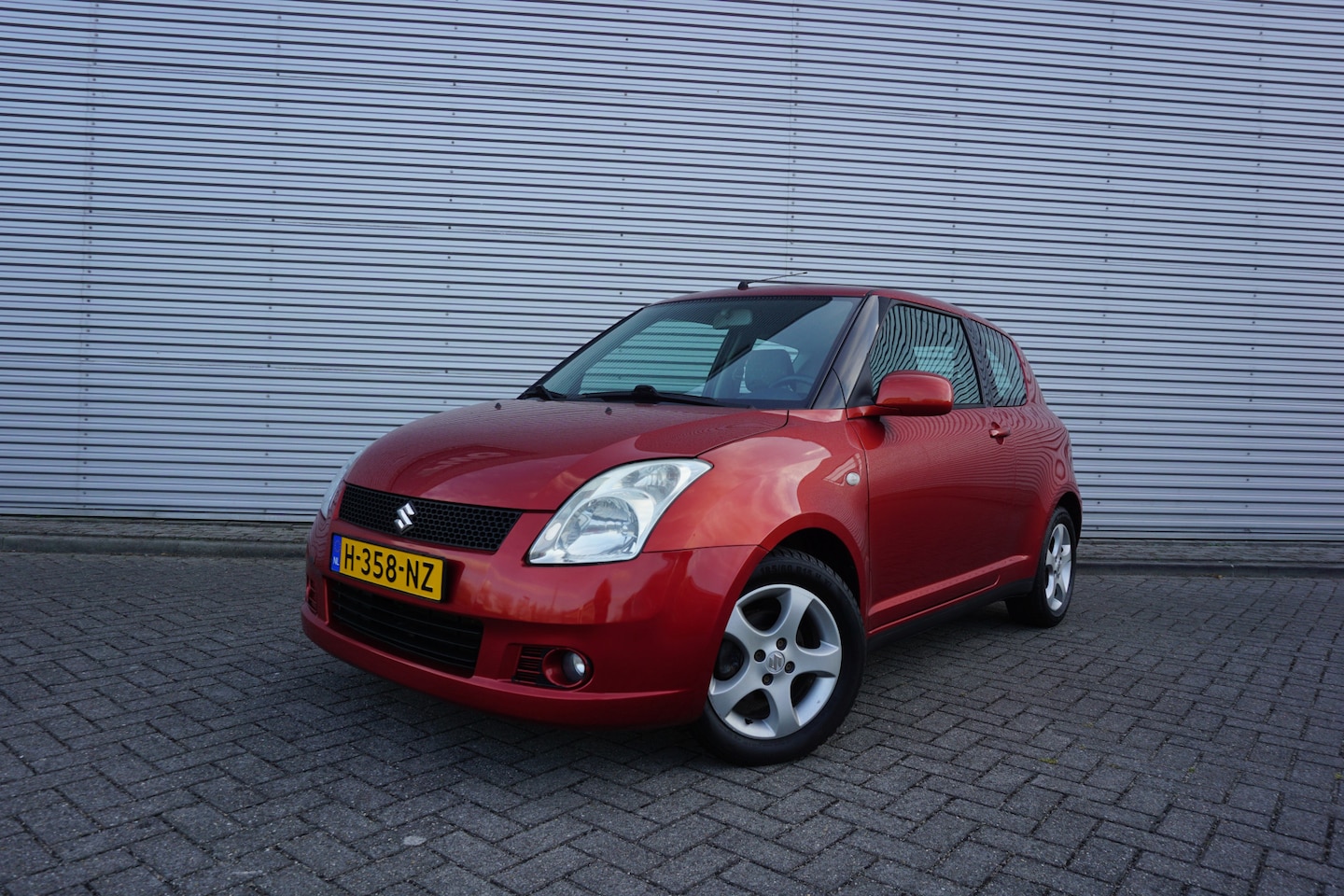 Suzuki Swift - 1.5 Comfort Airco / Elektr. ramen / Stoelverwarming / Lm velgen - AutoWereld.nl