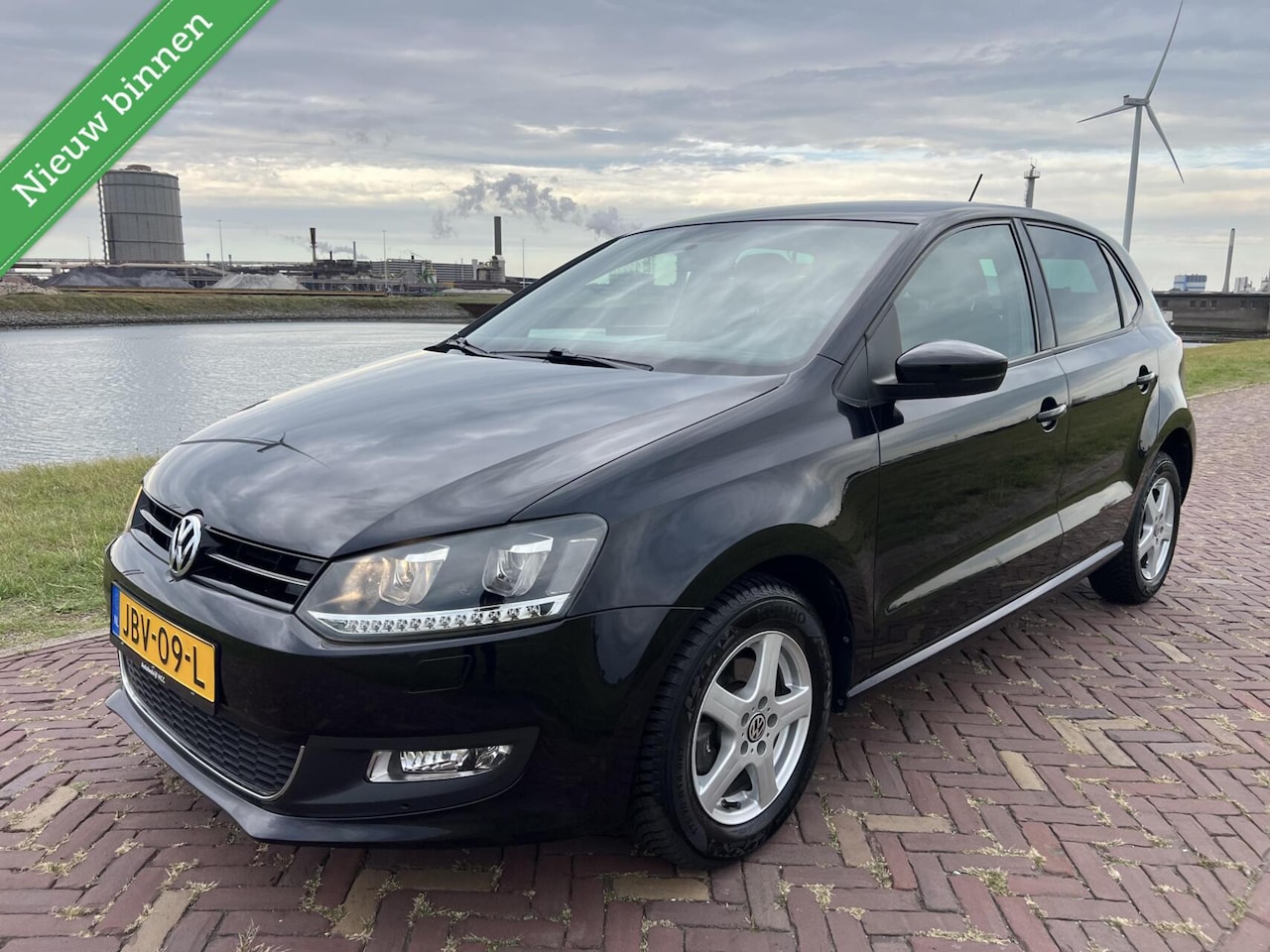 Volkswagen Polo - 1.2 Highline 2013 AIRCO|NAVIGATIE|NW APK - AutoWereld.nl