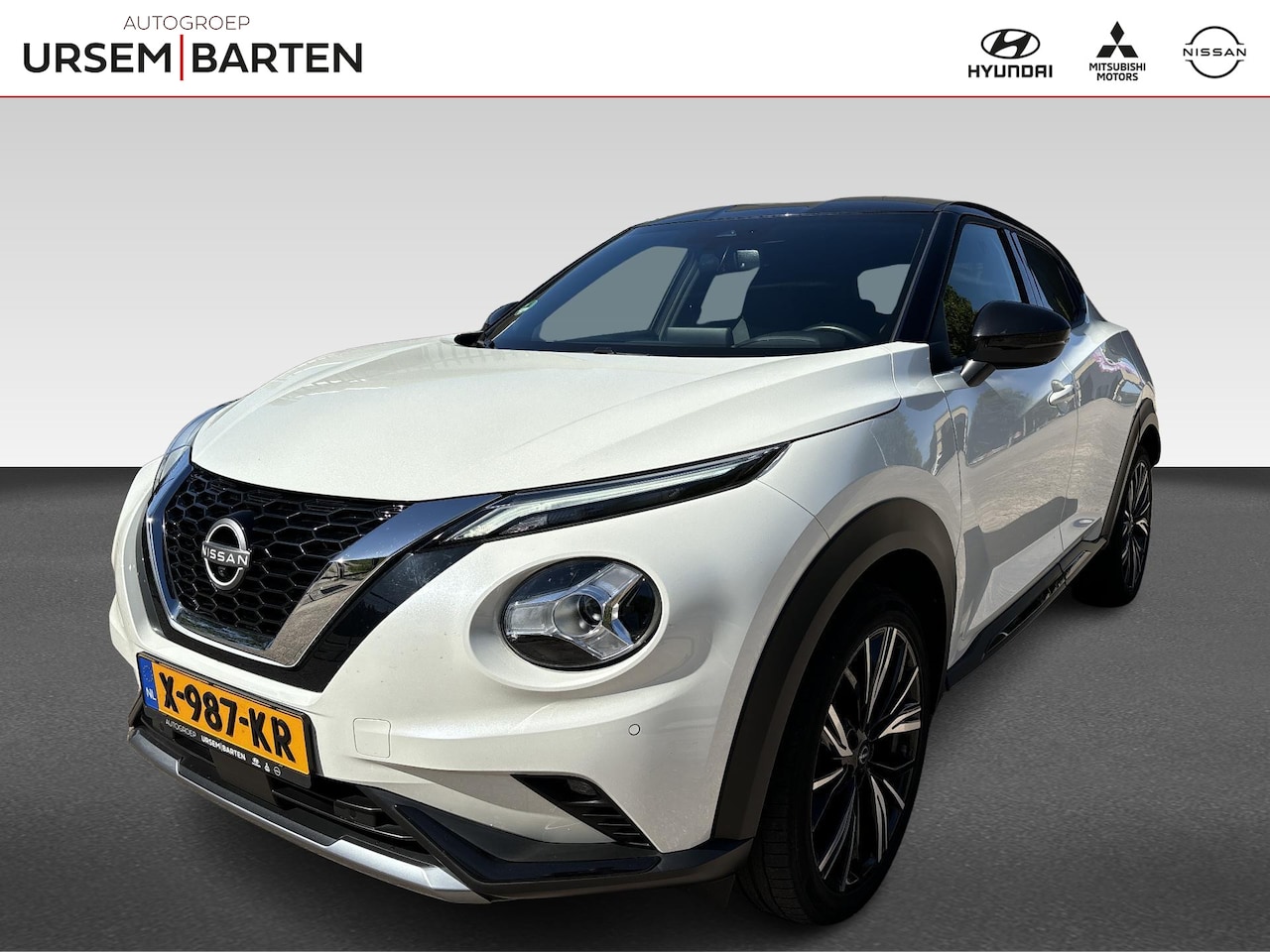 Nissan Juke - 1.0 DIG-T N-Design | Half leder stof interieur | 360 graden camera | Navigatie | - AutoWereld.nl