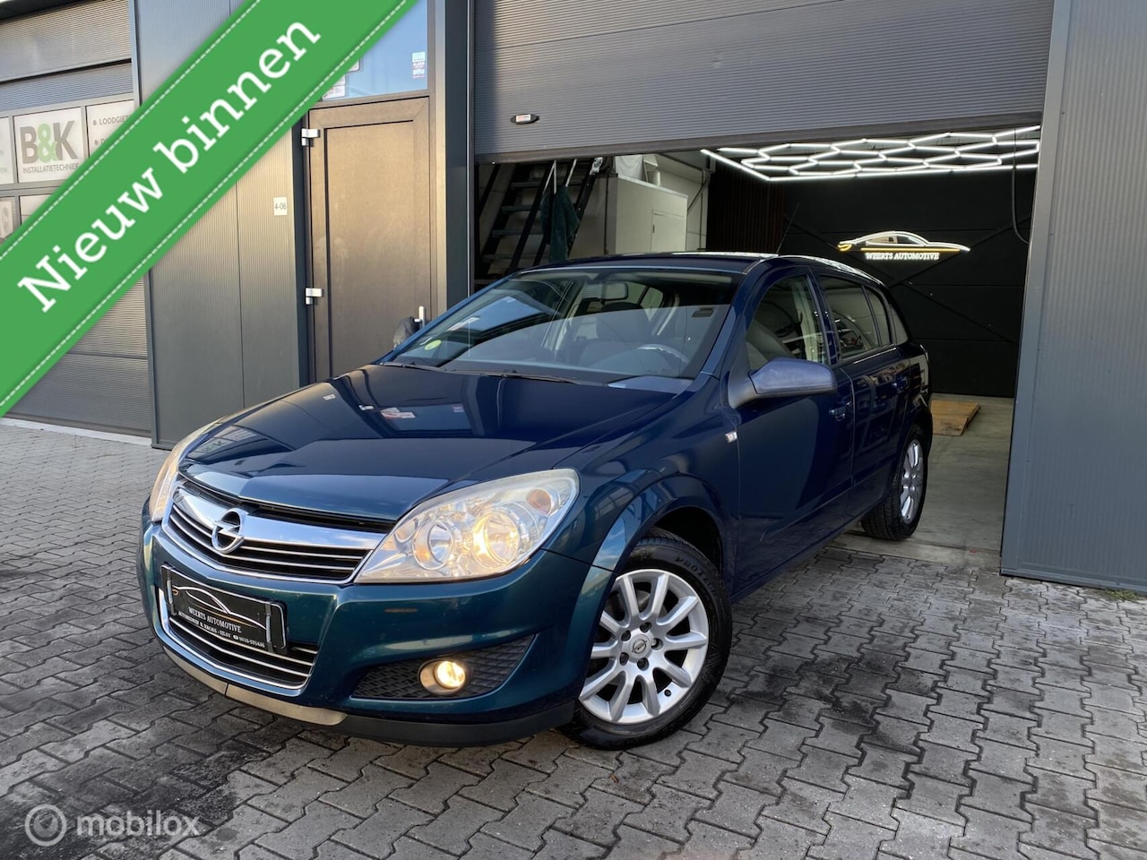 Opel Astra - 1.6 Temptation |NAVI|AIRCO|TREKHAAK|PDC|CRUISE| - AutoWereld.nl