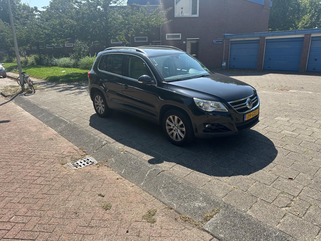 Volkswagen Tiguan - 2.0 TSI Sport&Style 4Motion 4x4 Leder Cruise Parkassist - AutoWereld.nl