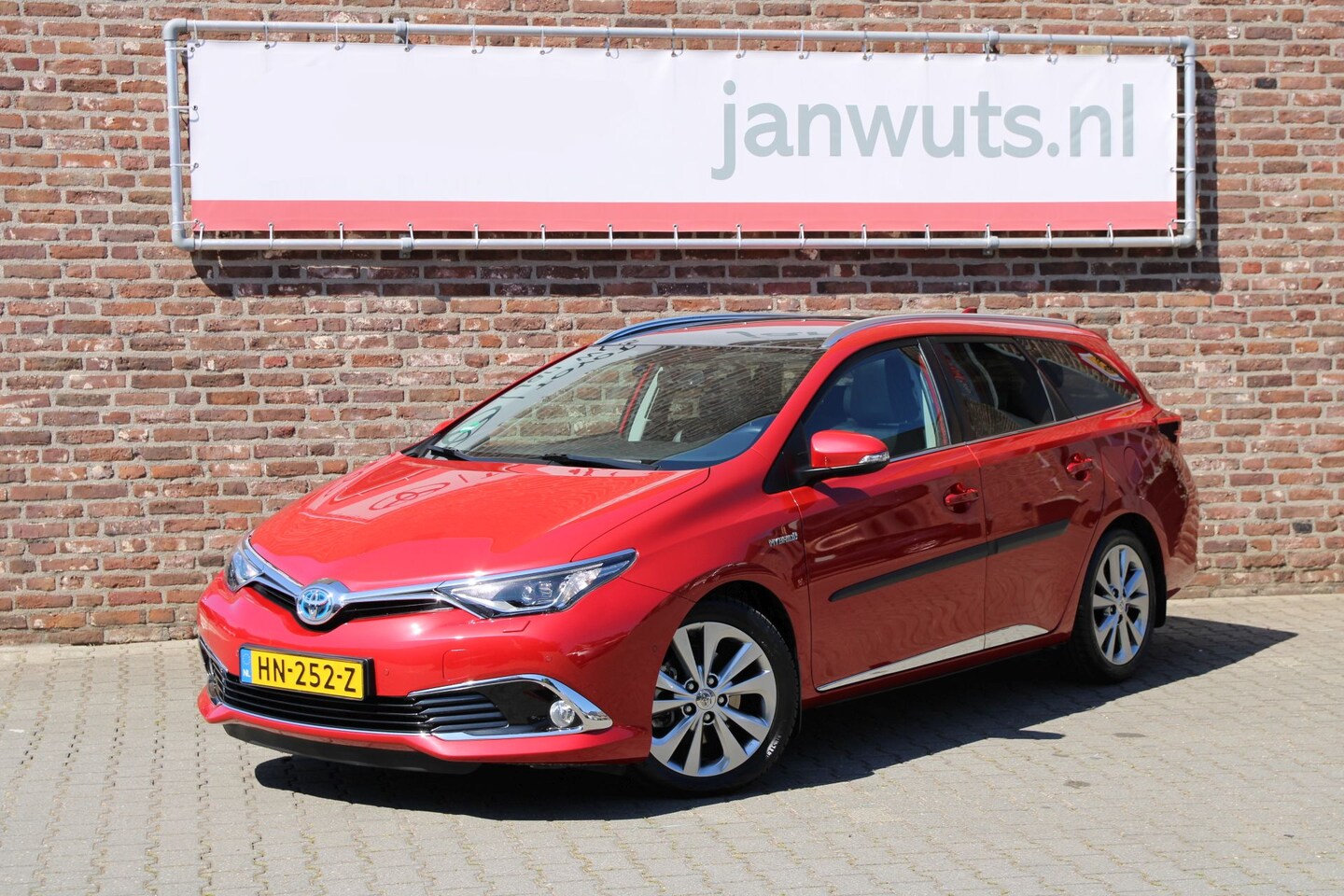 Toyota Auris Touring Sports - 1.8 Hybrid Executive + Panoramadak + PDC - AutoWereld.nl