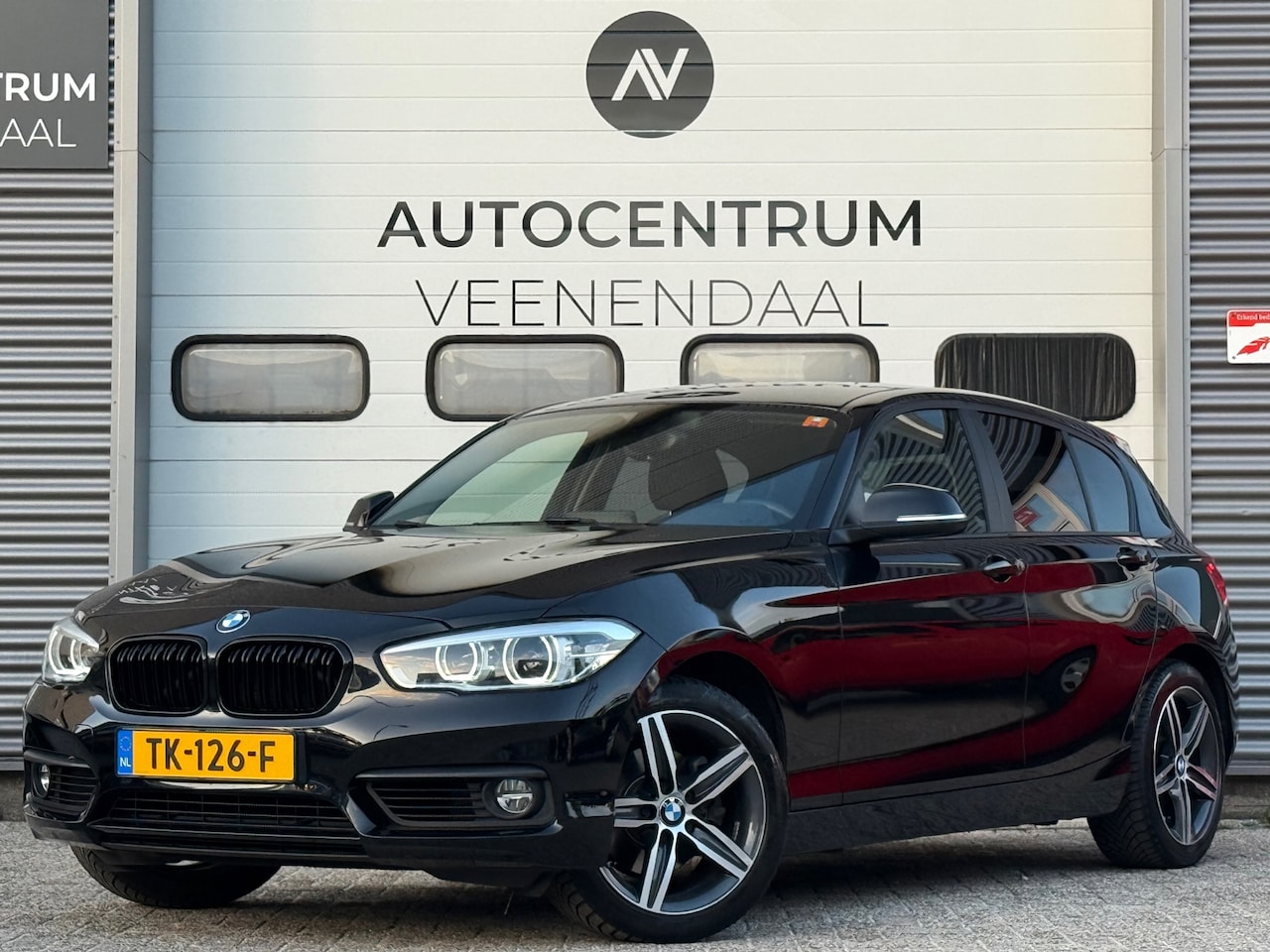 BMW 1-serie - 120i Executive AUT 184 PK LED/NL AUTO/CARPLAY/CRUISE/NAP - AutoWereld.nl