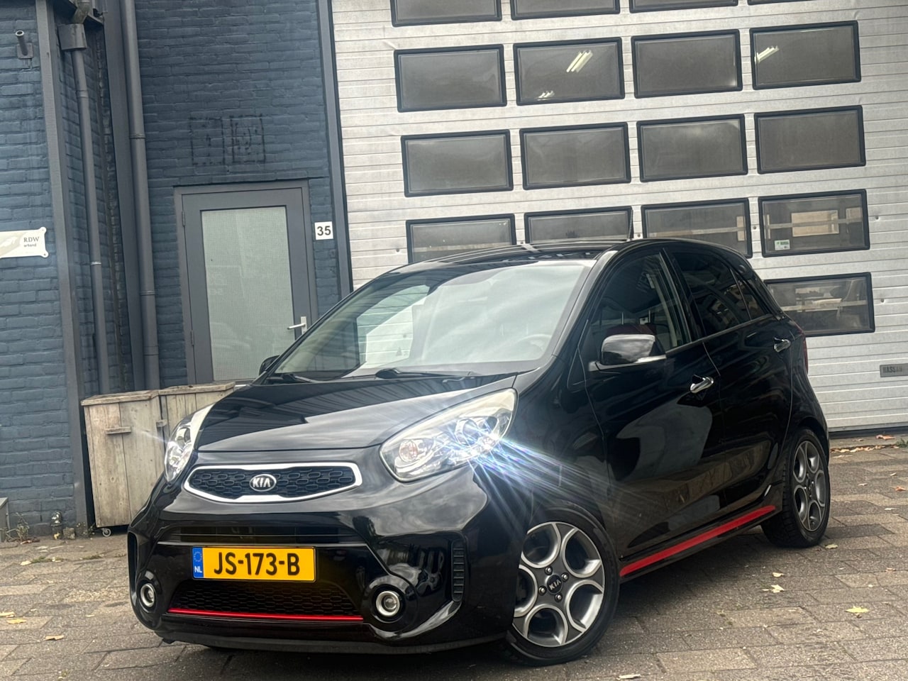 Kia Picanto - 1.2 CVVT SportsLine Navigator | Clima | Camera | Cruise | Navi - AutoWereld.nl