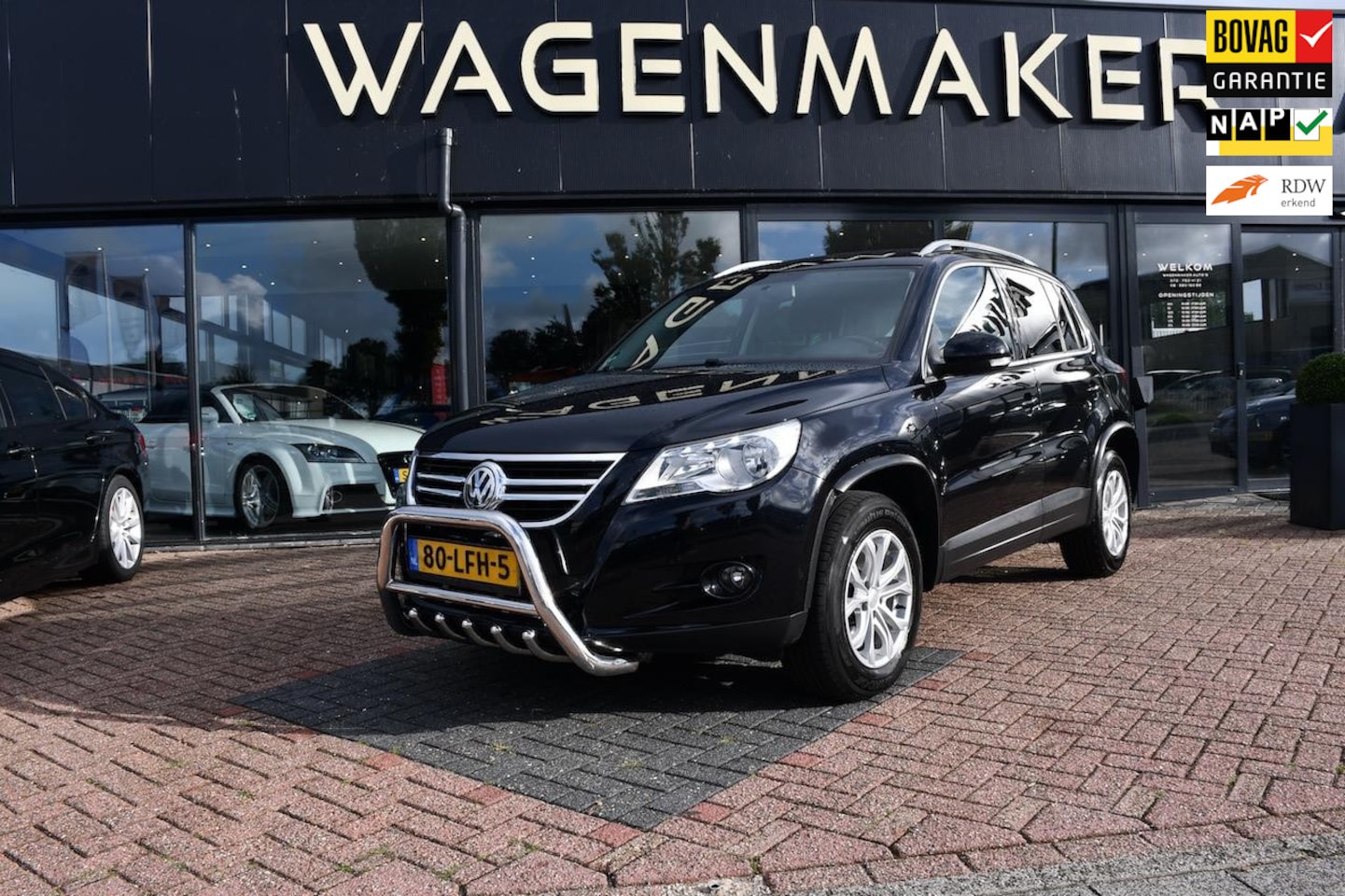 Volkswagen Tiguan - 2.0 TSI Sport&Style 4Motion NAVI|Cruise - AutoWereld.nl