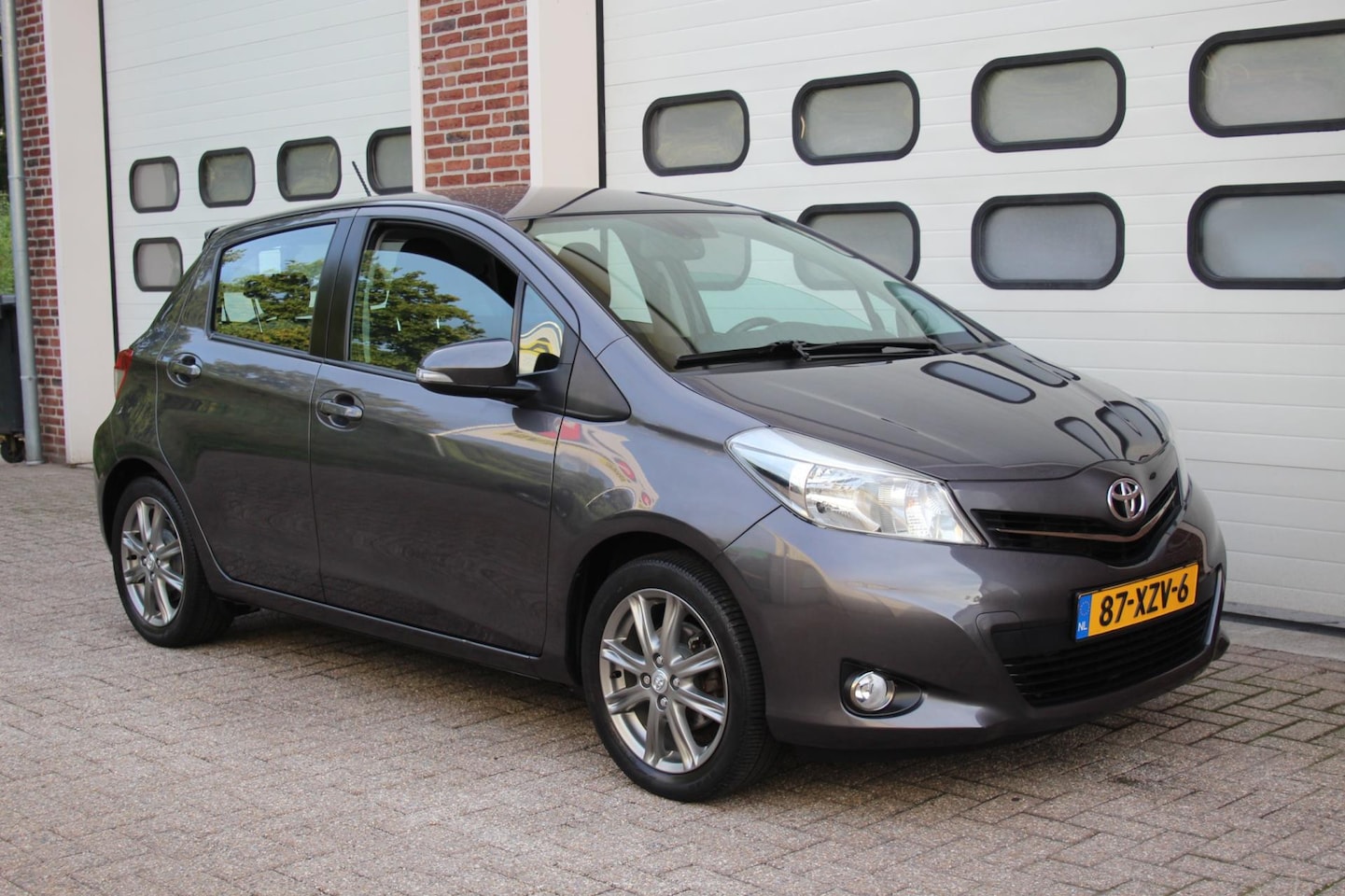 Toyota Yaris - 1.3 VVT-i Dynamic * Navi / Cruise / Nap / Trekhaak * - AutoWereld.nl