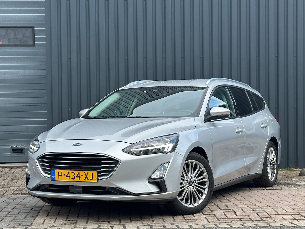 Ford Focus Wagon - 1.0 EcoBoost Titanium Business Winter Pack - AutoWereld.nl