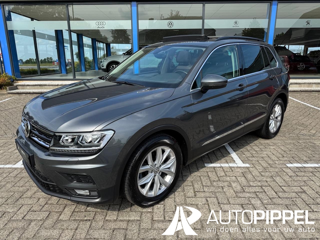 Volkswagen Tiguan - 1.5 TSI ACT Comfortline Business Panodak | NAV | LED | LMW 18" | dig. display | ACC - AutoWereld.nl