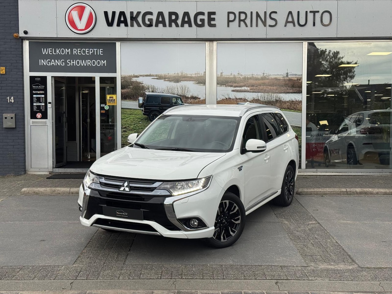 Mitsubishi Outlander - 2.0 PHEV Premium |CAMERA|CLIMA|LEDER|CRUISE| 3359 - AutoWereld.nl