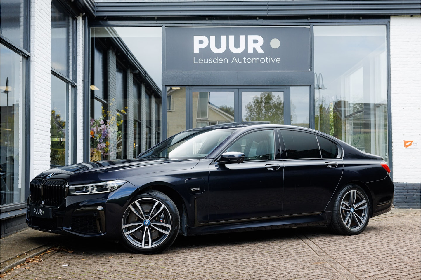 BMW 7-serie - 745e M-Sport Individual Pano - Soft Close - 360view - Head Up - AutoWereld.nl