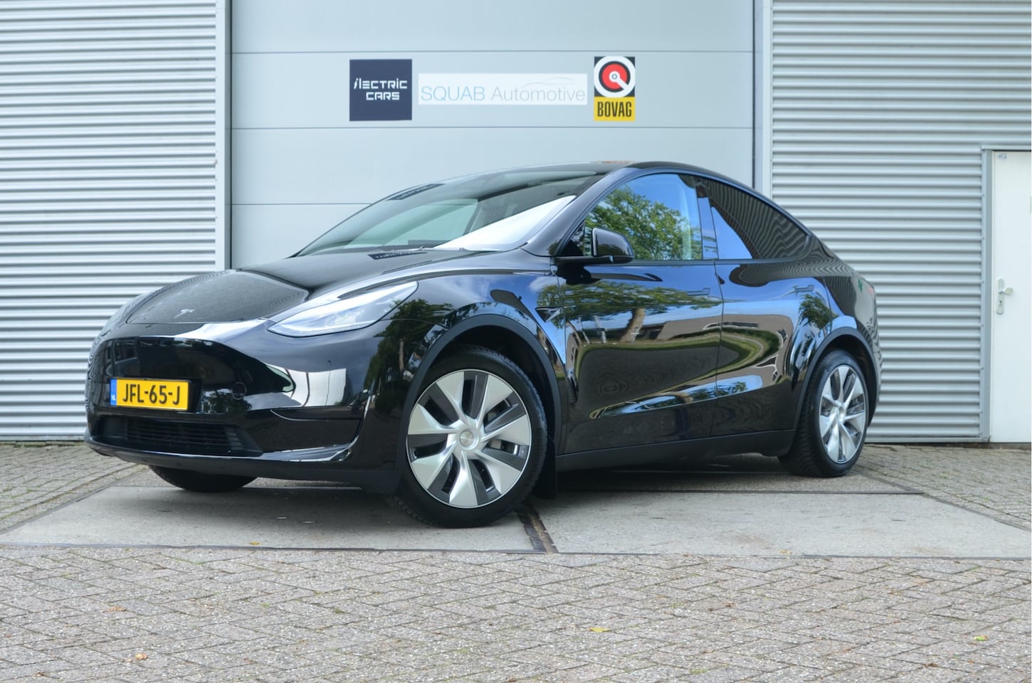 Tesla Model Y - RWD 58 kWh Trekhaak (1.600kg), AutoPilot - AutoWereld.nl