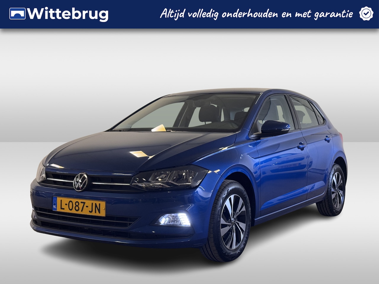 Volkswagen Polo - 1.0 TSI Comfortline Lichtmetaal ! Navigatie ! - AutoWereld.nl