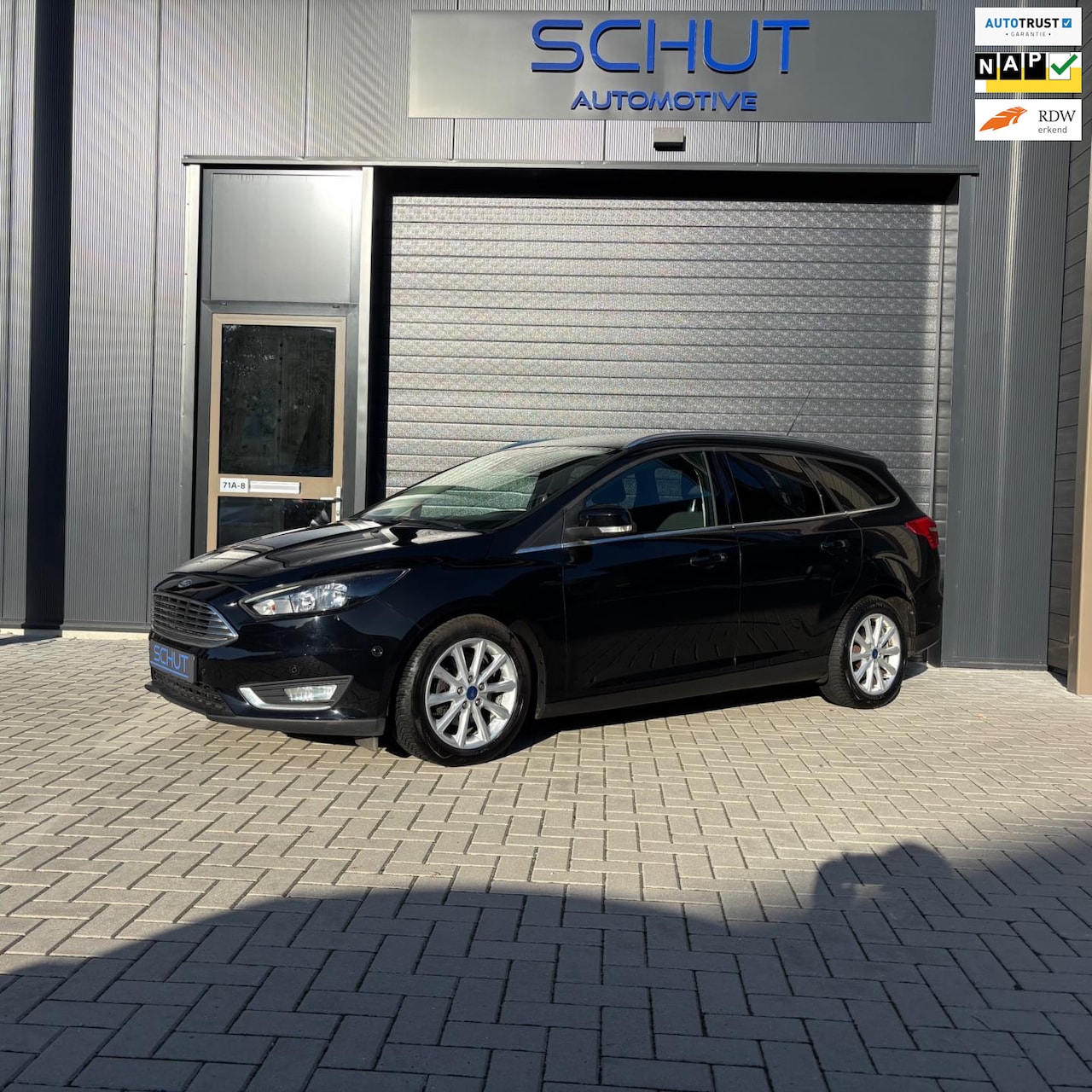 Ford Focus Wagon - 125pk Titanium NAVI | CLIMA | CRUISE CONTROL | STOELVERWARMING | APK 2027 | PARKASSIST | S - AutoWereld.nl