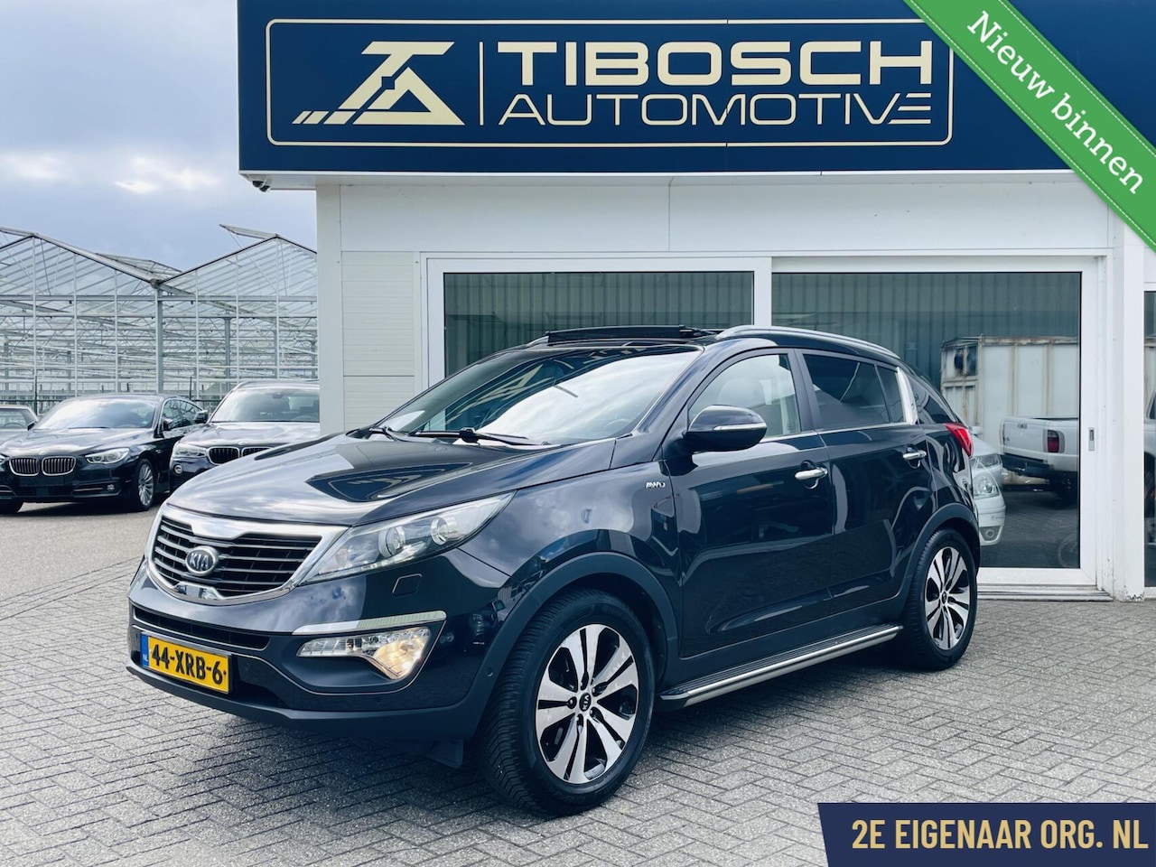 Kia Sportage - 2.0 AWD X-ecutive 4x4 Pano Leder Trekhaak Xenon - AutoWereld.nl