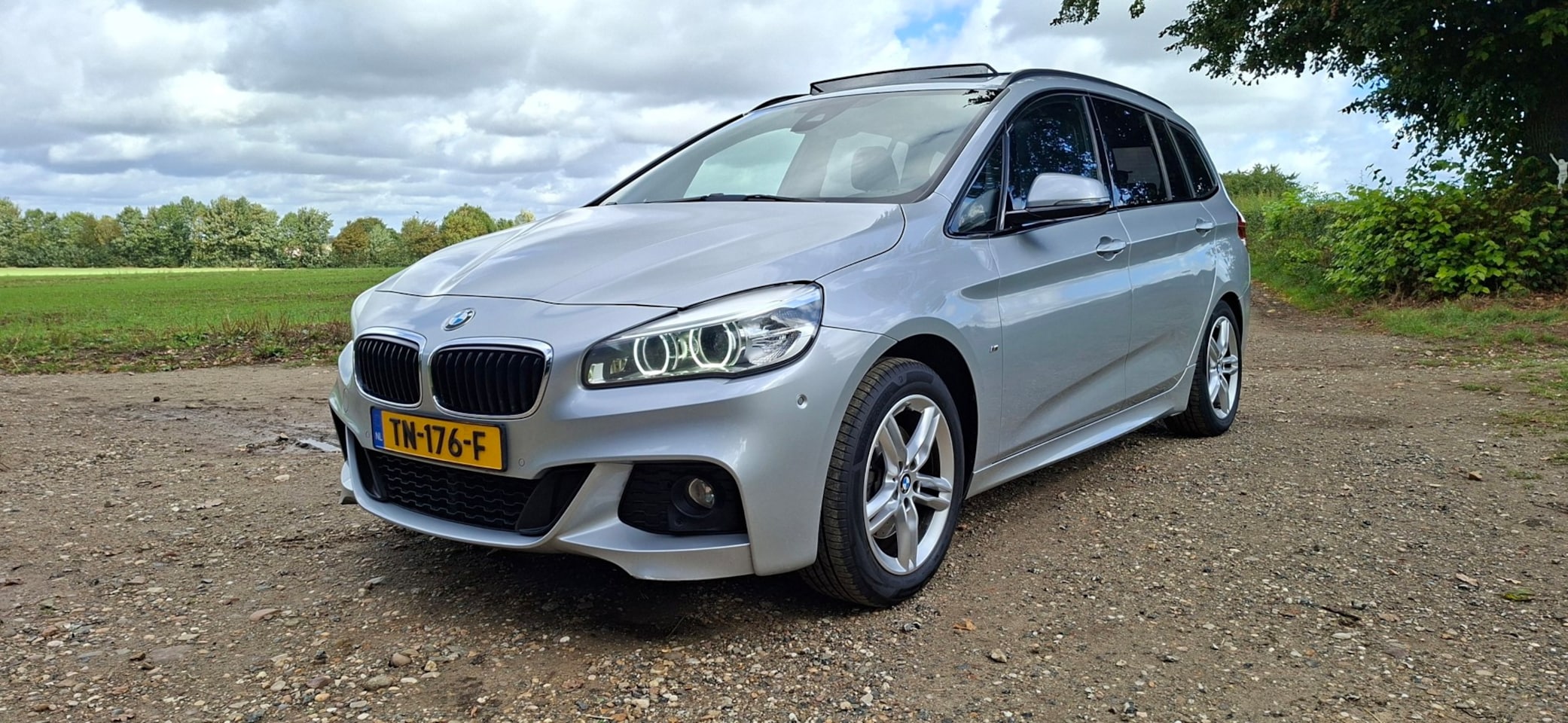 BMW 2-serie Gran Tourer - 218i Gran Tourer automaat/pano/leder/M pakket - AutoWereld.nl