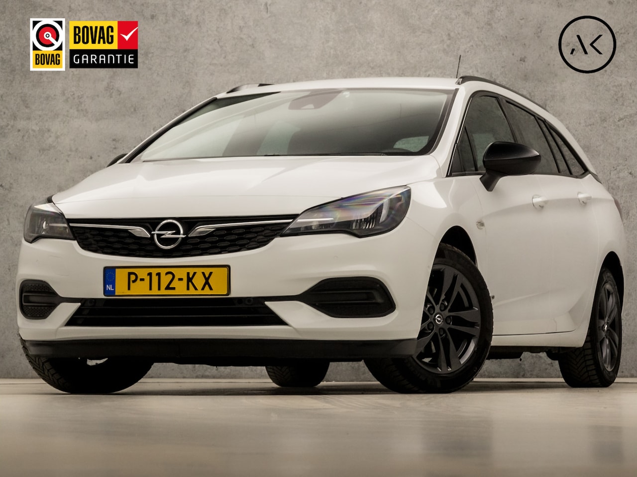 Opel Astra Sports Tourer - 1.2 Black & White Sport (APPLE CARPLAY, NAVIGATIE, CLIMATE, CAMERA, ADAPTIVE CRUISE, SPORT - AutoWereld.nl