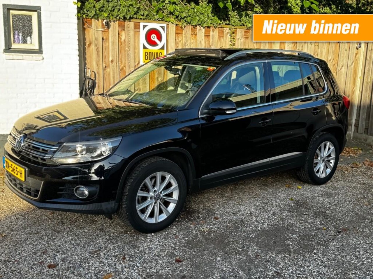 Volkswagen Tiguan - 1.4 TSI SPORTenSTYLE panoramadak. - AutoWereld.nl