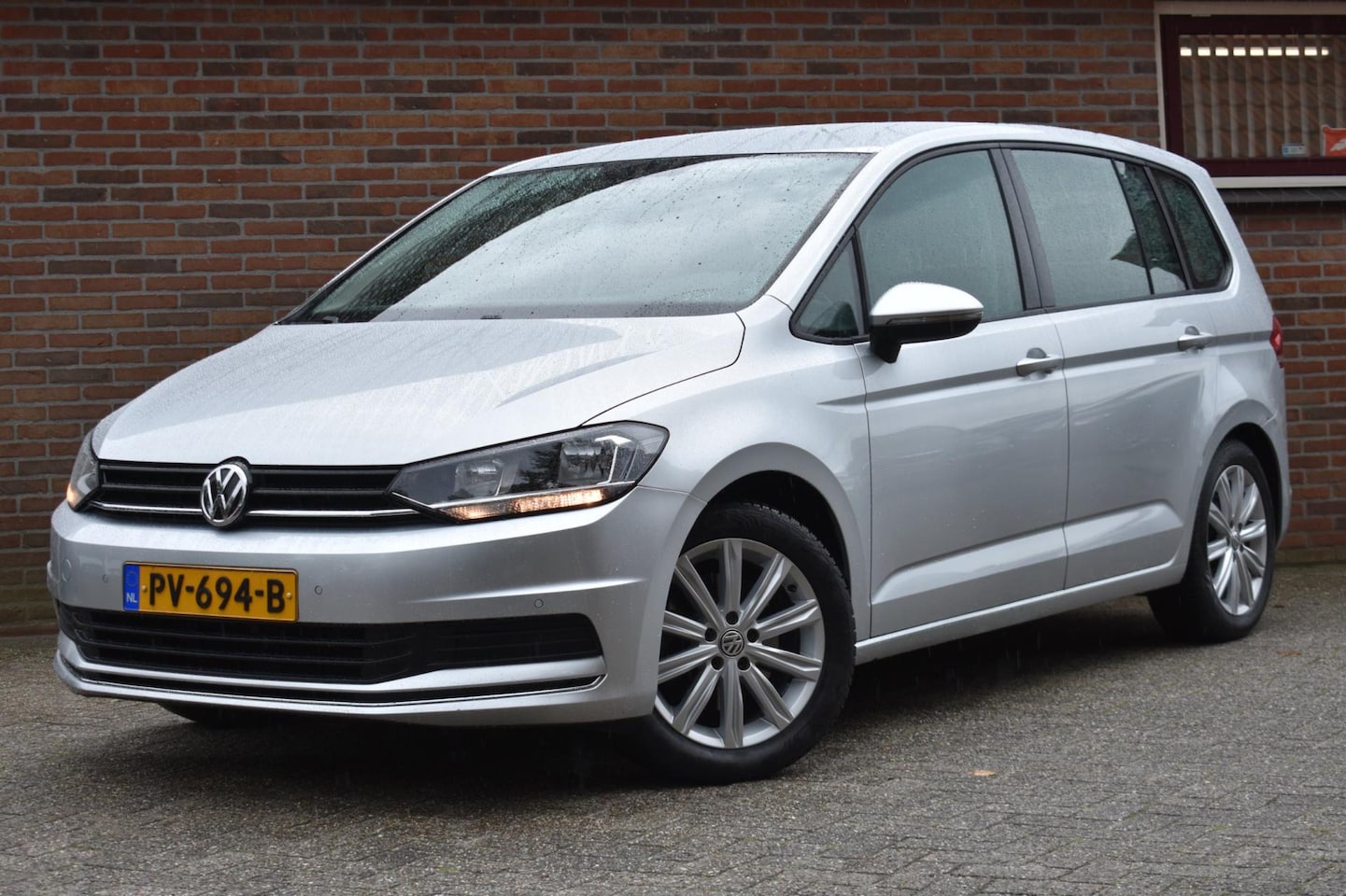 Volkswagen Touran - 1.2 TSI Comfortline 7p '16 Navi Clima - AutoWereld.nl