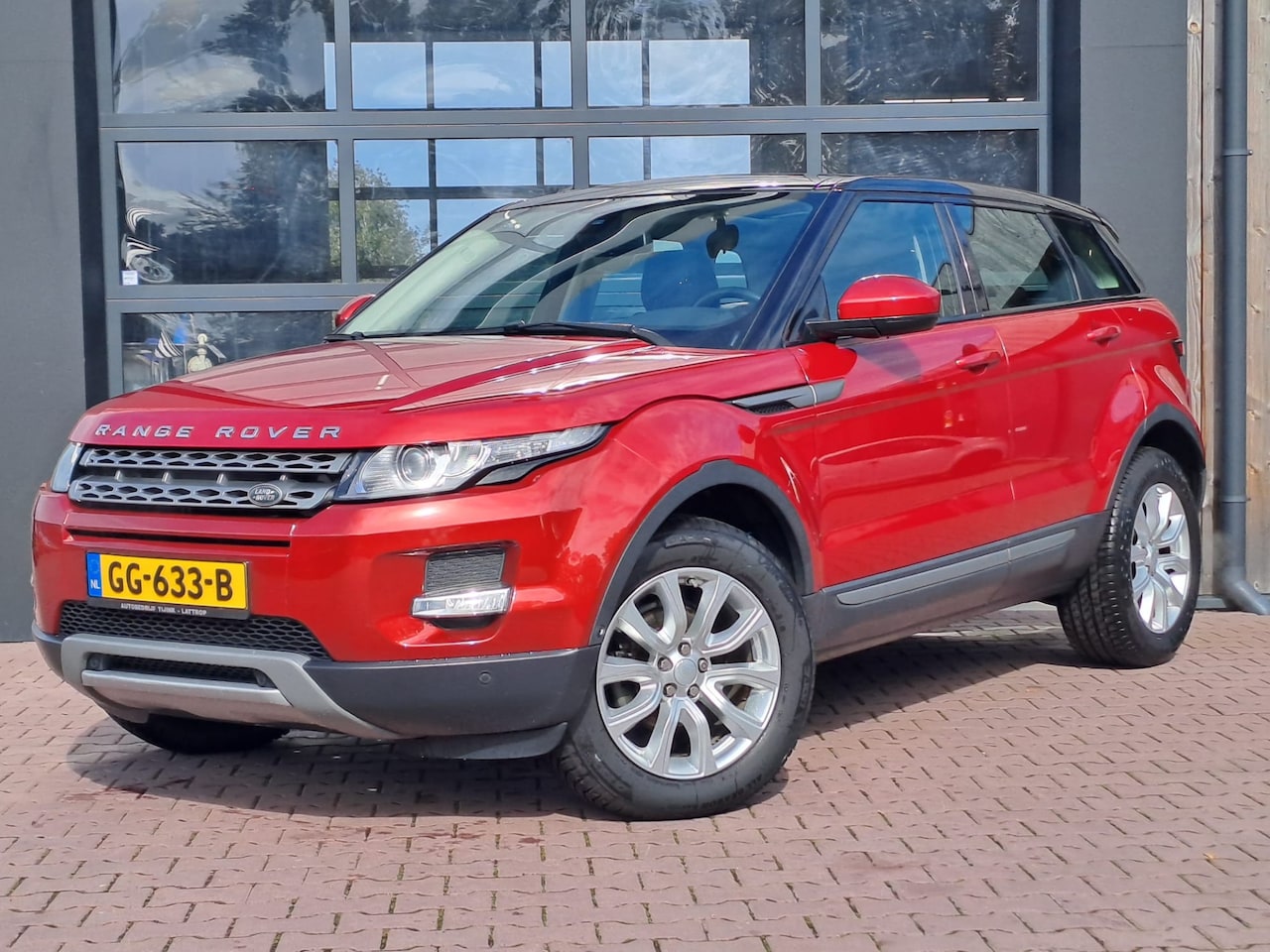 Land Rover Range Rover Evoque - 2.0 Si 4WD Pure Business Edition | Automaat | Pano | Trekhaak | Navi | Leder | 4X4 | - AutoWereld.nl