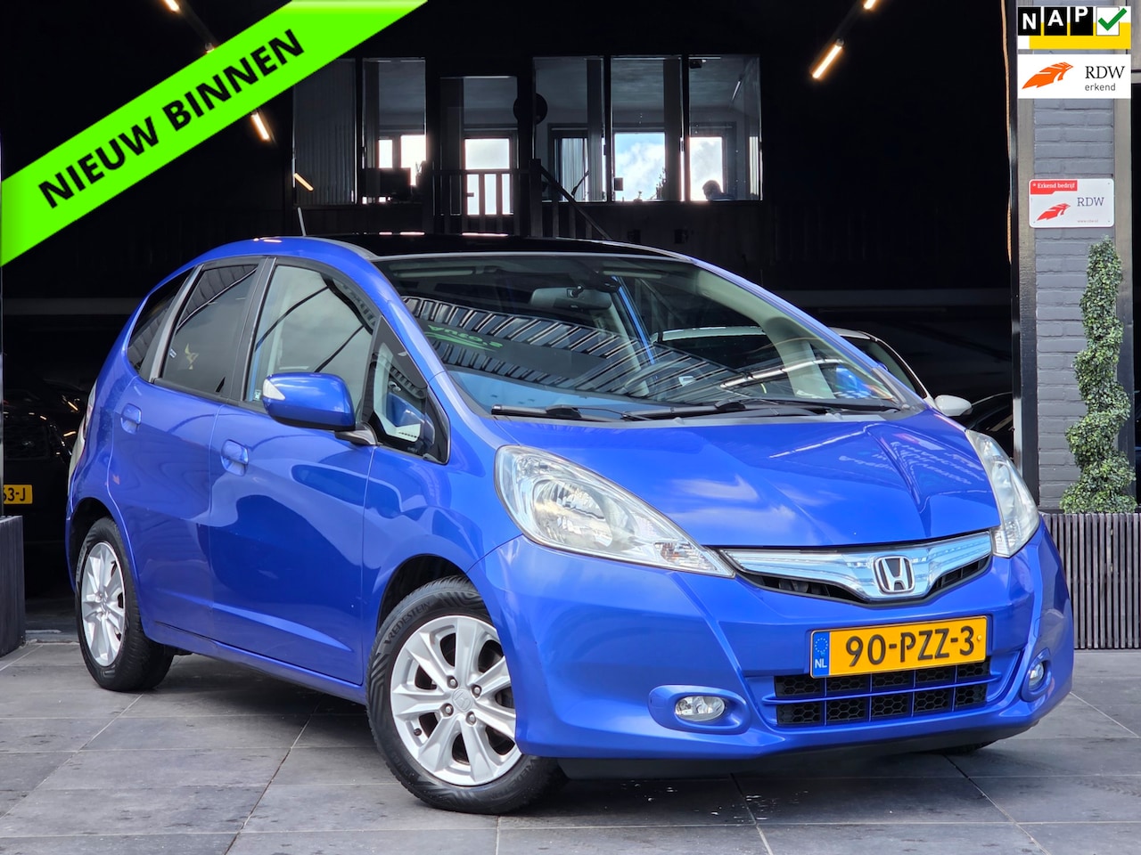 Honda Jazz - 1.4 Hybrid Exclusive 2e EIG|AUT|PANO|LEER|CRUISE - AutoWereld.nl