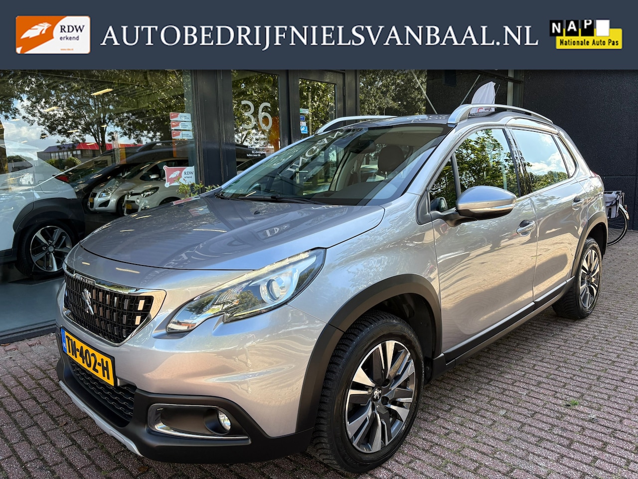 Peugeot 2008 - 1.2 PureTech Allure Automaat/Navi/Clima/PDC/Cruise - AutoWereld.nl