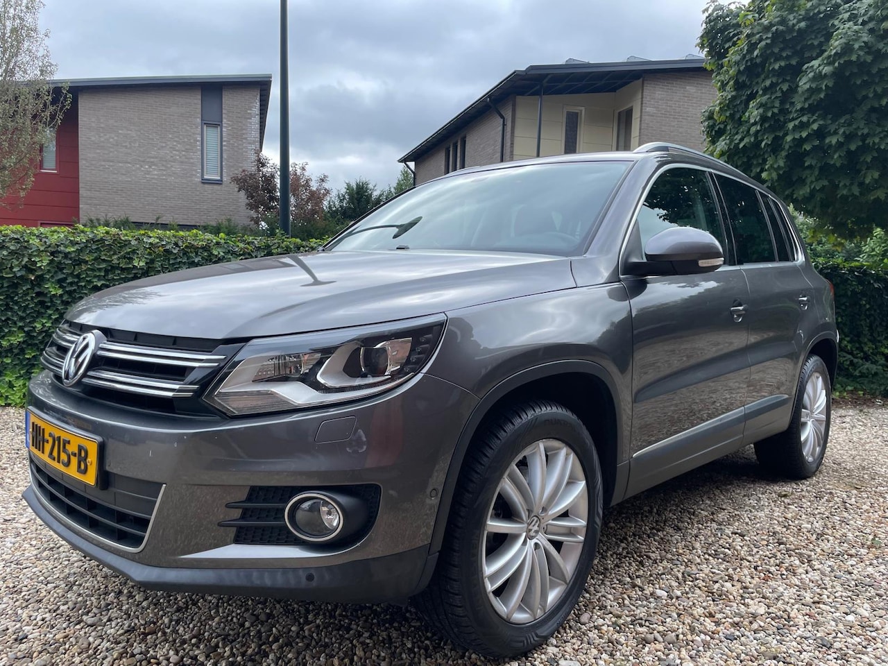 Volkswagen Tiguan - 2.0 TSI Sport&Style 4Motion - AutoWereld.nl