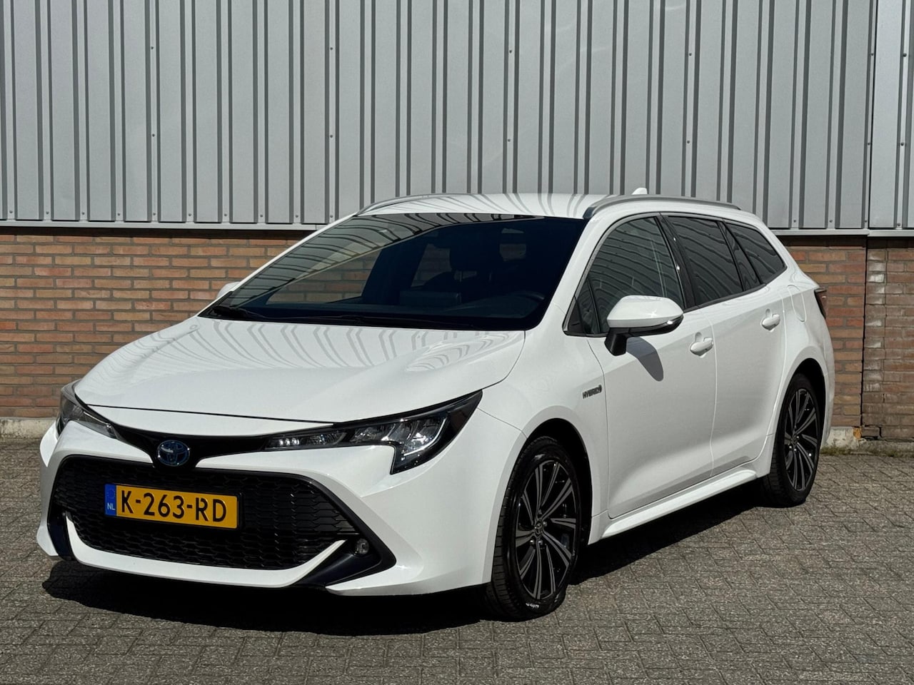 Toyota Corolla Touring Sports - 1.8 Hybrid Dynamic Carplay/ Keyless/ Garantie - AutoWereld.nl