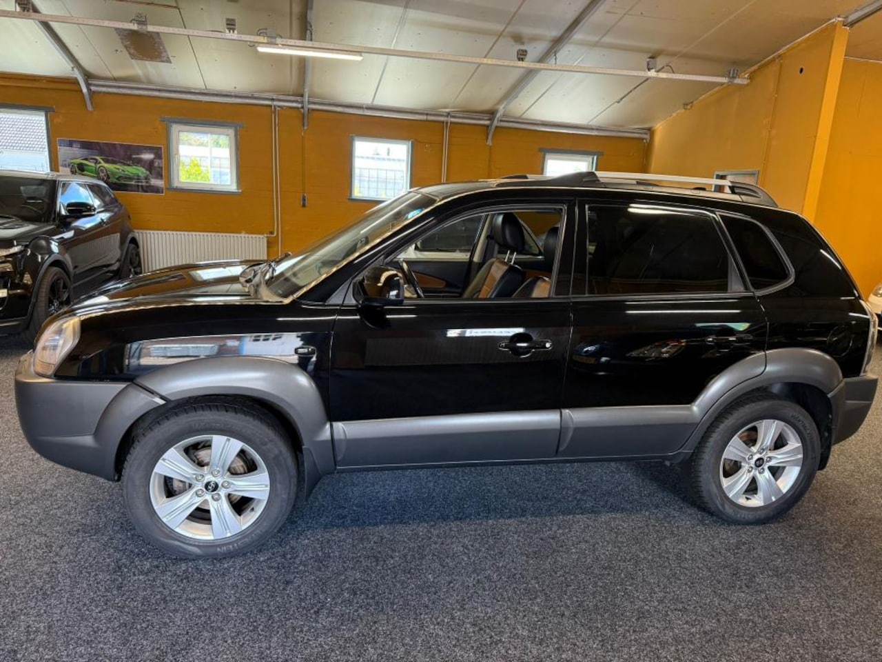 Hyundai Tucson - 2.0i Style Premium 2.0i Style Premium - AutoWereld.nl