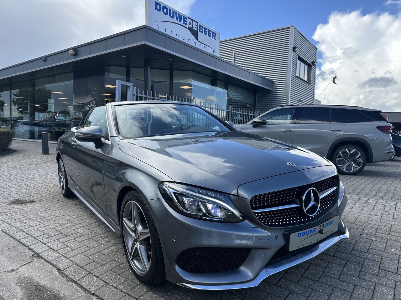 Mercedes-Benz C-klasse Cabrio - 180 AMG Line Nekverwarming | Stoelverw. | Camera | Intelligent LED - AutoWereld.nl