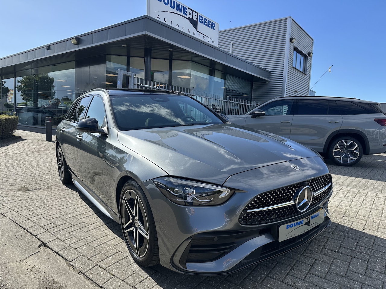 Mercedes-Benz C-klasse Estate - 180 AMG Line Trekhaak | Pano | Night - AutoWereld.nl