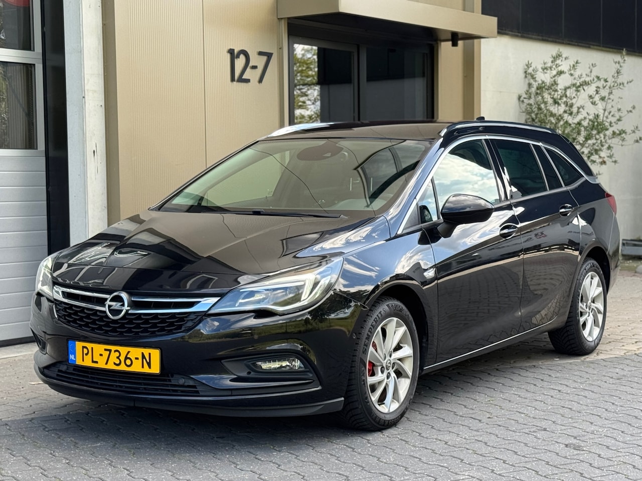 Opel Astra Sports Tourer - 1.4|Innovation|camera|carplay| - AutoWereld.nl