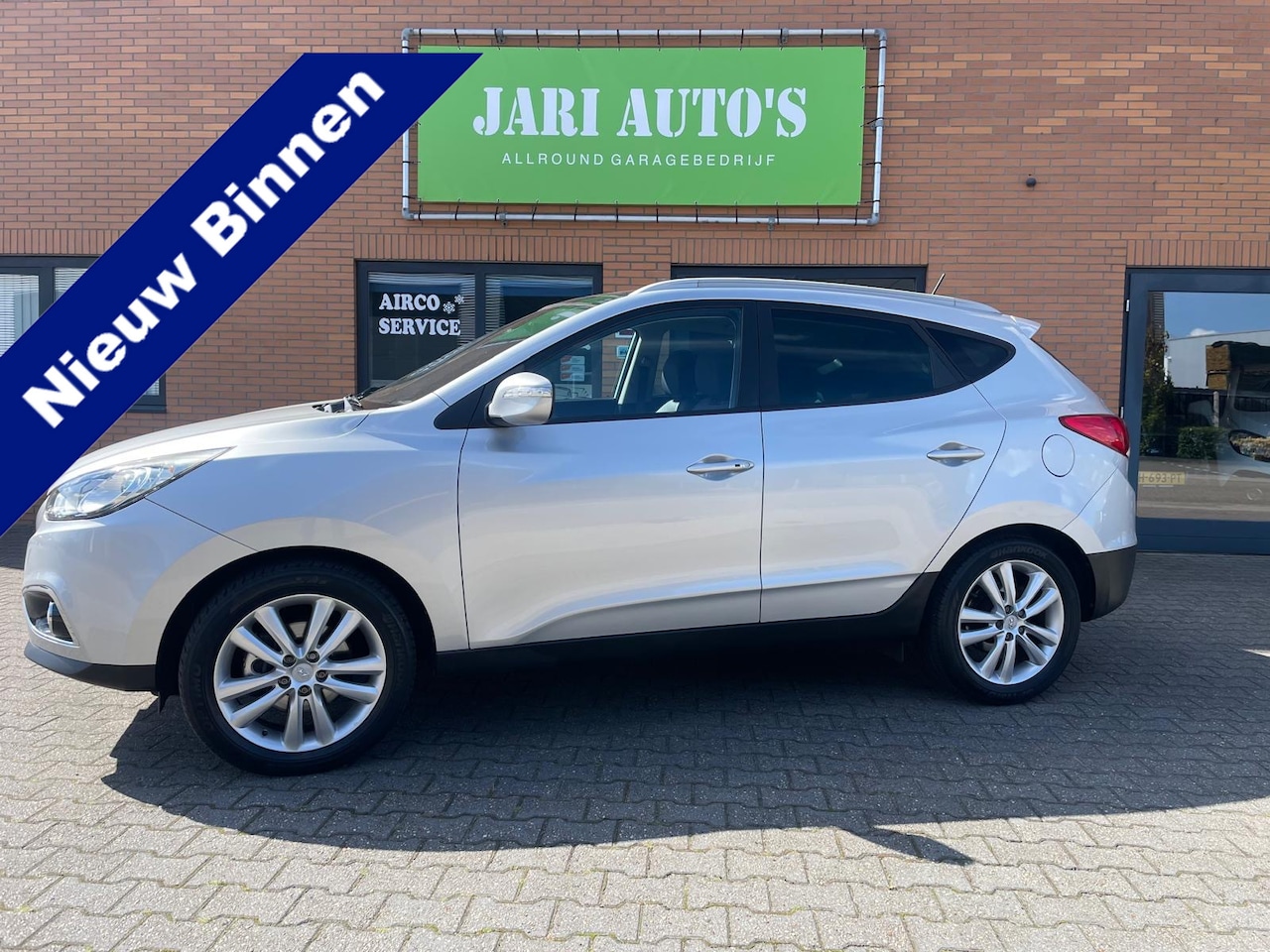Hyundai ix35 - 2.0i 4WD i-Catcher Automaat ! Weinig km ! - AutoWereld.nl