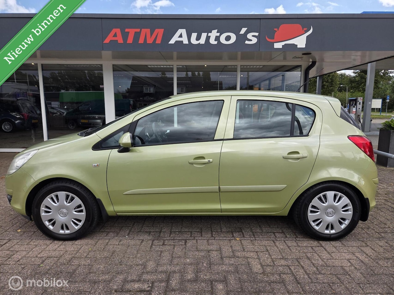 Opel Corsa - 1.4-16V Enjoy 5Drs Apk 06-2026 all season banden - AutoWereld.nl