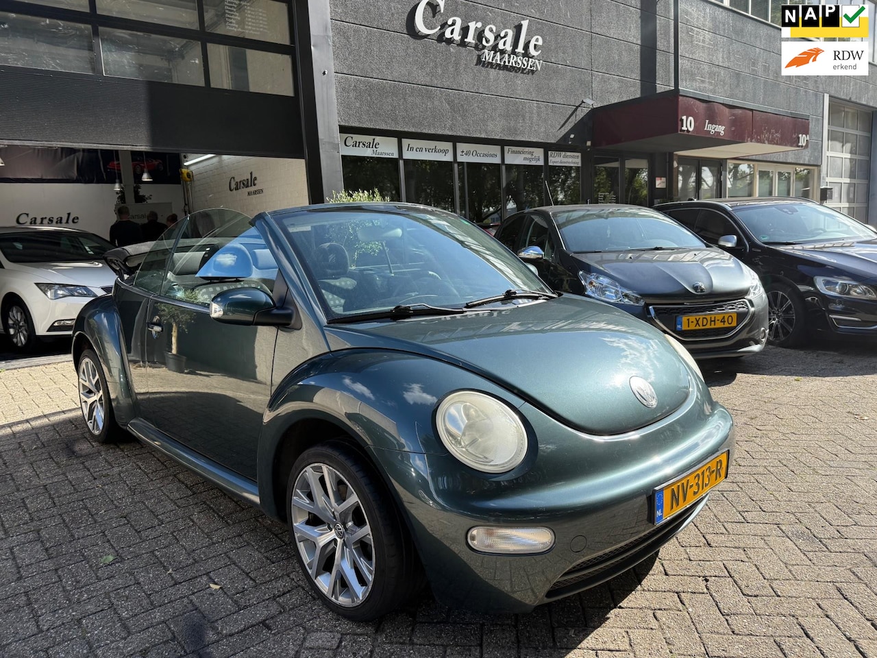 Volkswagen New Beetle Cabriolet - 1.4 Highline cabrio - AutoWereld.nl