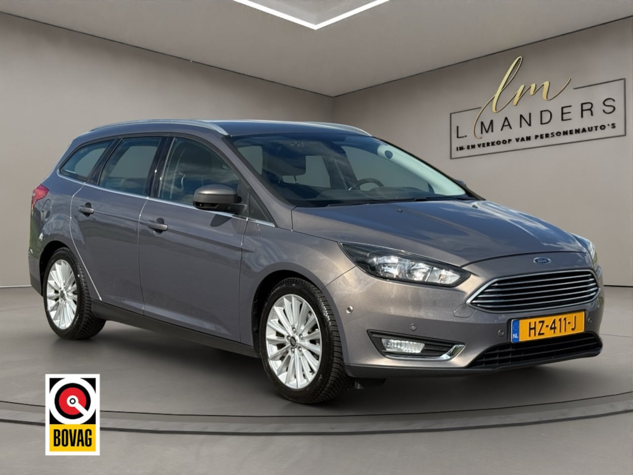 Ford Focus Wagon - 1.0 Titanium 2016 BRUIN | Trekhaak | Airco | NL - AutoWereld.nl