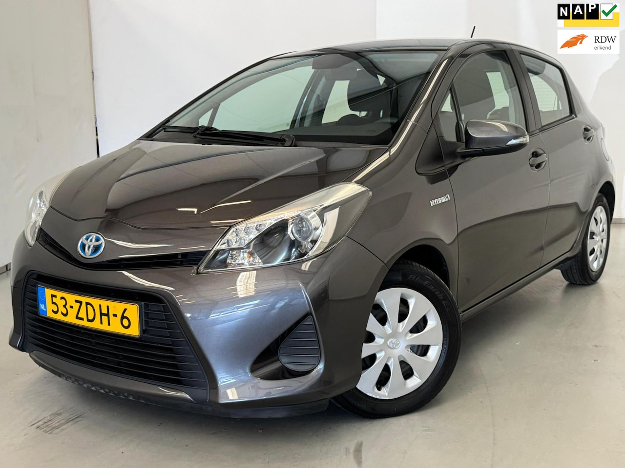Toyota Yaris - 1.5 Full Hybrid Aspiration / NL-auto / Navi / Camera - AutoWereld.nl