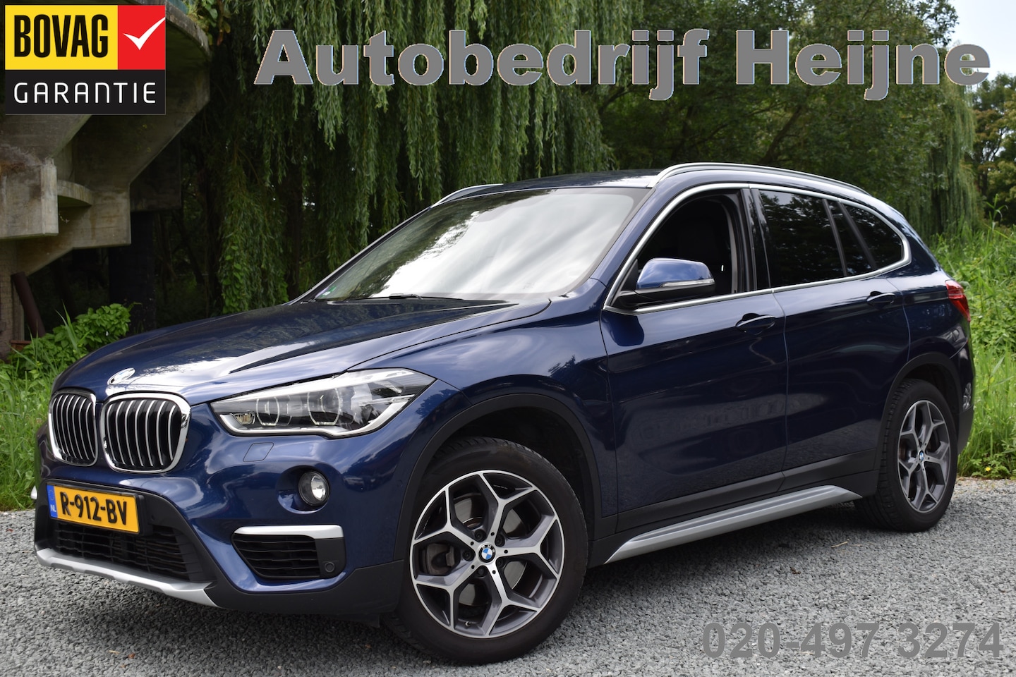 BMW X1 - 20IA AUT 192PK ORANGE EDITION III CAMERA/LEDER/NAVI/TREKHAAK - AutoWereld.nl