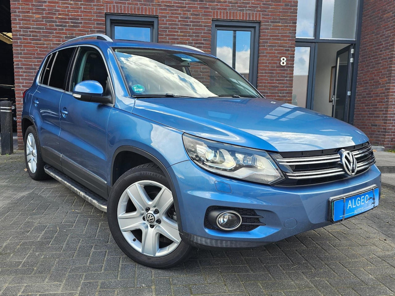 Volkswagen Tiguan - 2.0 TSI Track& Style 4Motion / 2e eigenaar - AutoWereld.nl