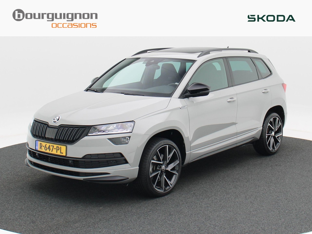 Skoda Karoq - 1.5 TSi 150 Pk Automaat Sportline Business | Panorama Dak | Trekhaak | Full LED | Adaptive - AutoWereld.nl