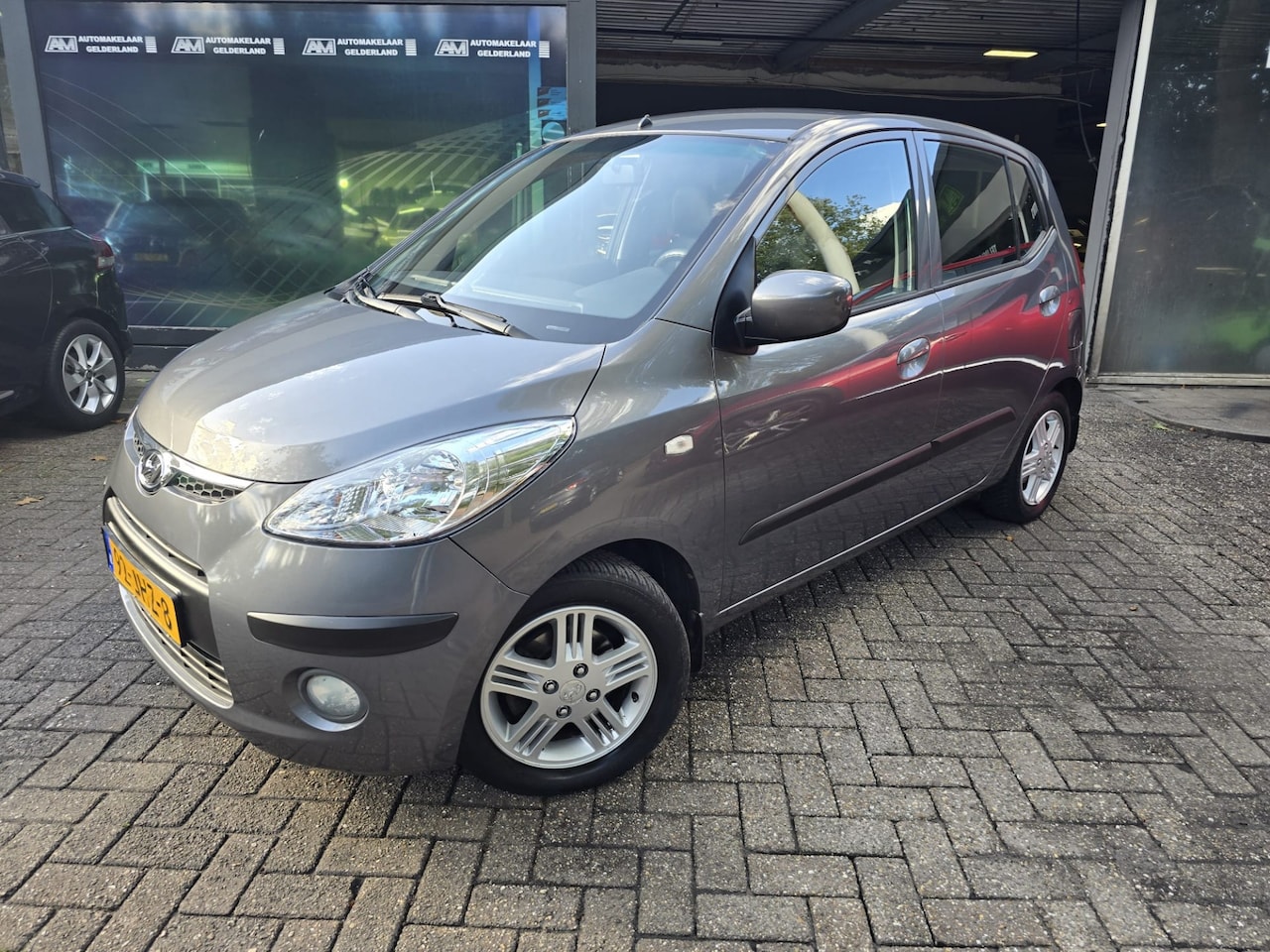 Hyundai i10 - 1.25i i-Catcher | 2E EIGENAAR | 12MND GARANTIE | AIRCO | LMV | - AutoWereld.nl