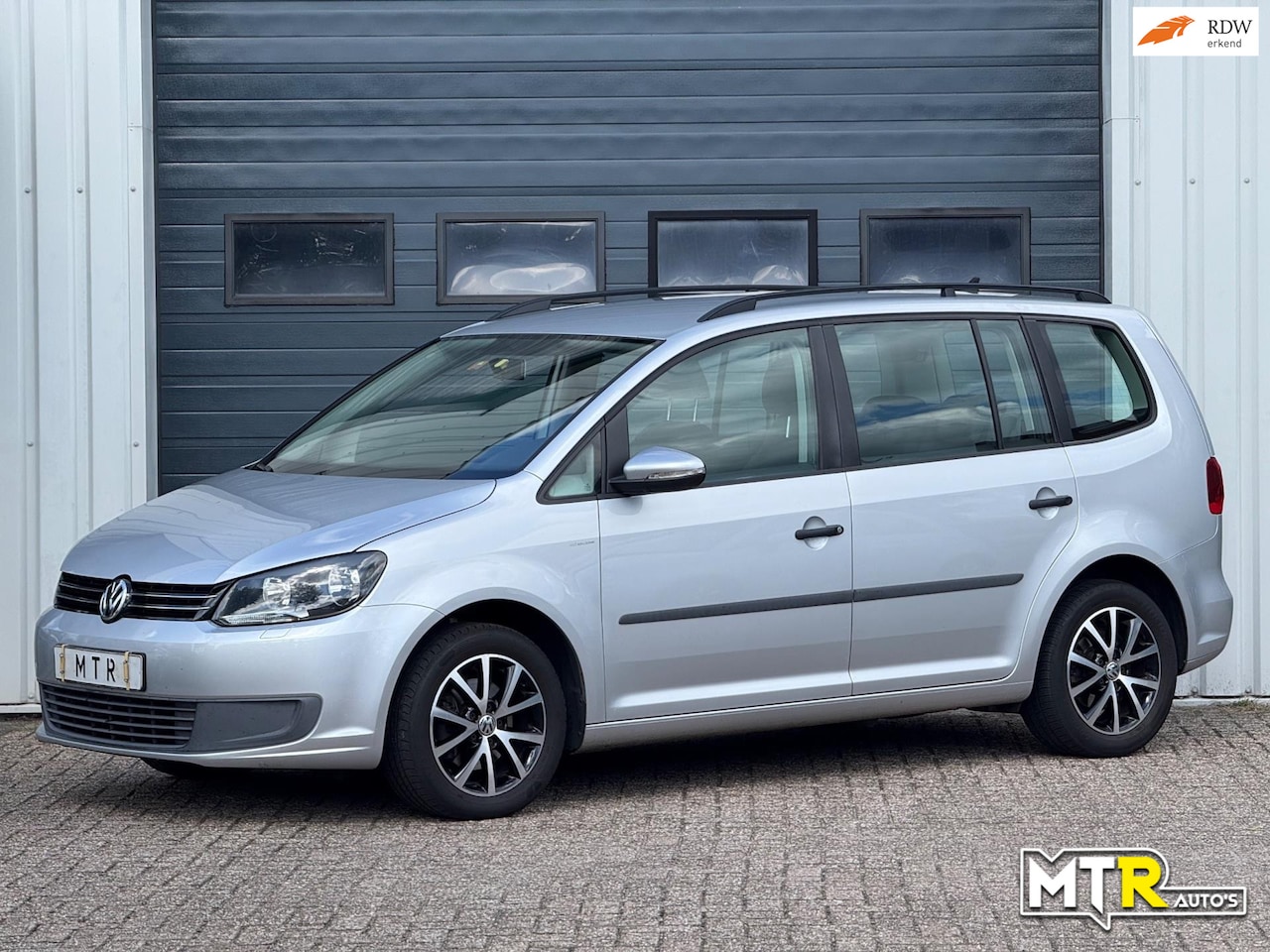 Volkswagen Touran - 1.4 TSI Highline 7p. AUT|KLIMA|NWE APK - AutoWereld.nl