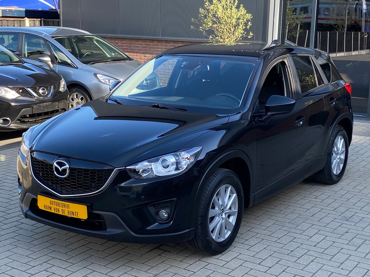 Mazda CX-5 - 2.0 TS+ NIEUWSTAAT XENON CRUISE CLIMA PDC KEYLESS NAVI TREKHAAK - AutoWereld.nl