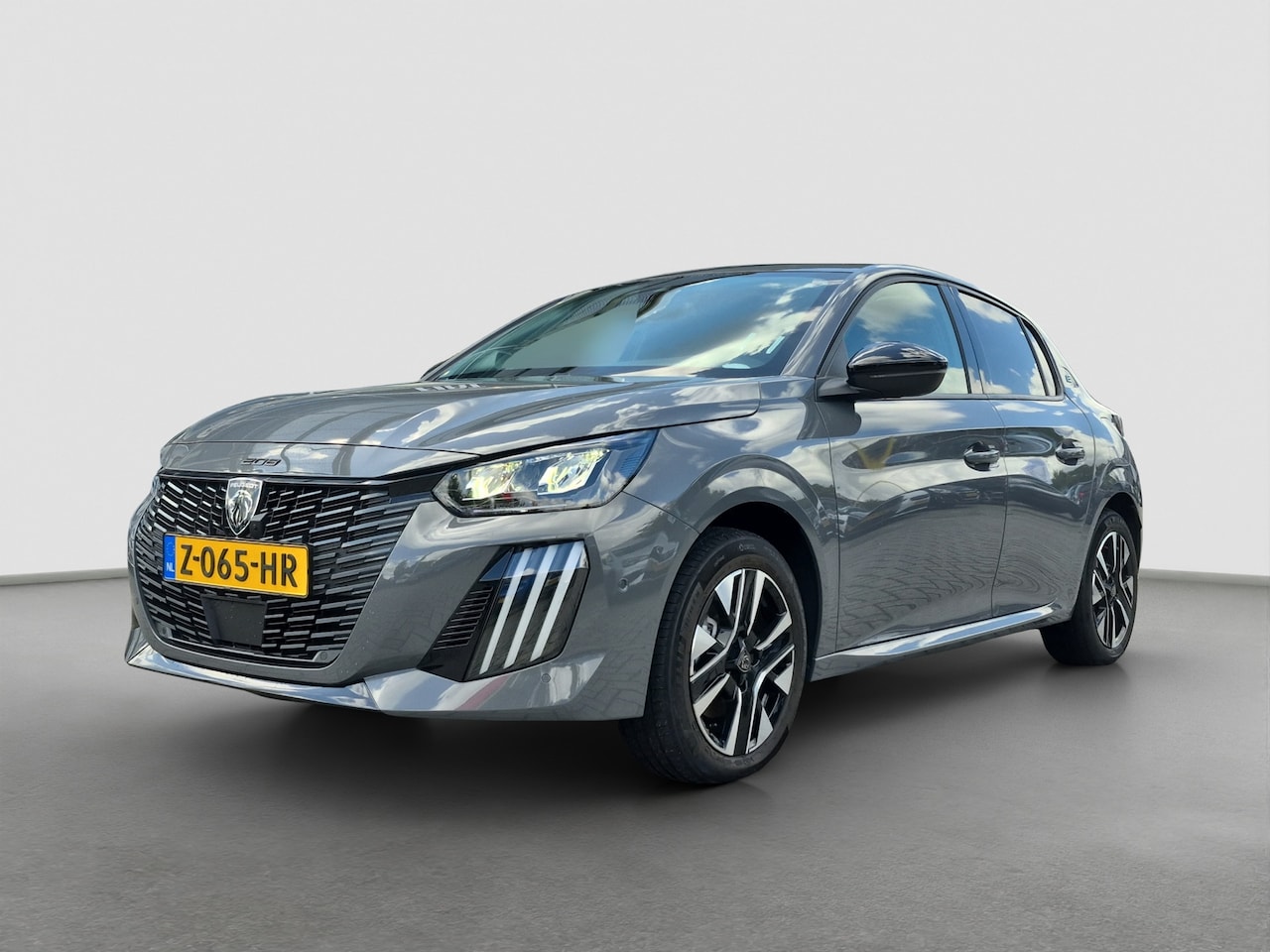 Peugeot e-208 - EV Allure 51 kWh 3 fase laden | Camera | Warmtepomp | LED | Half leder | - AutoWereld.nl