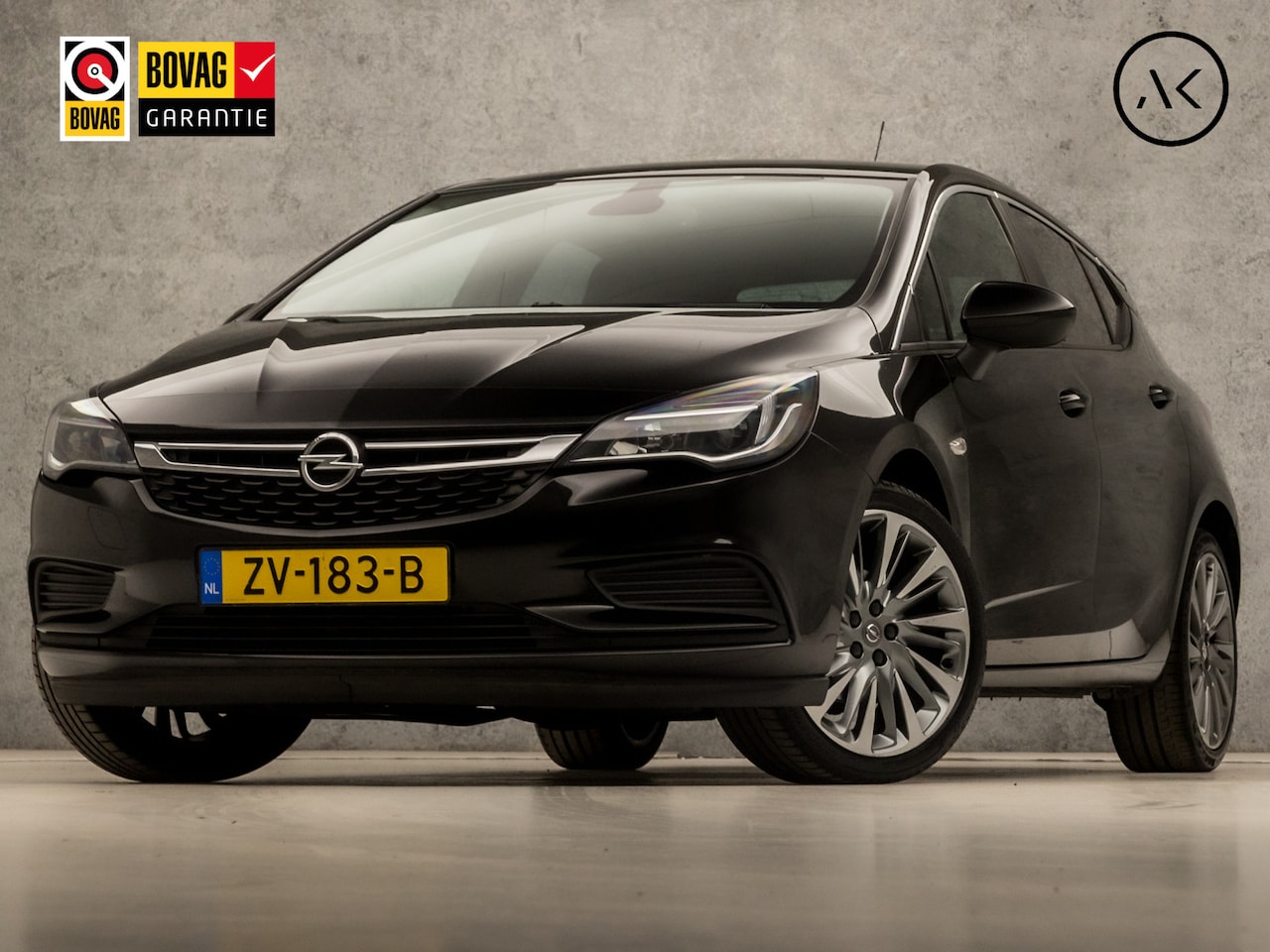 Opel Astra - 1.0 Turbo Sport (APPLE CARPLAY, NAVIGATIE, GETINT GLAS, LM VELGEN, SPORTSTOELEN, PARKEERSE - AutoWereld.nl