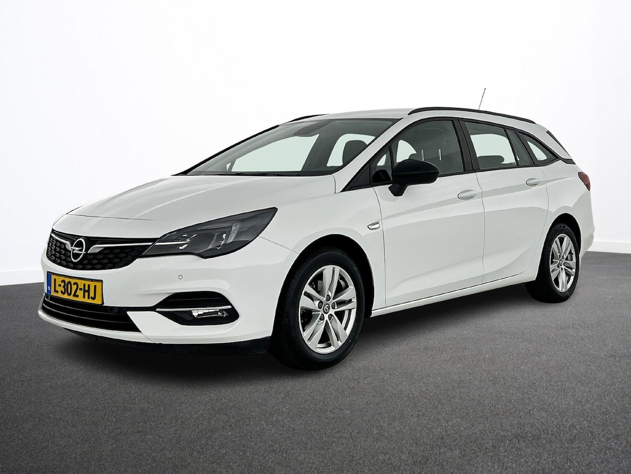 Opel Astra Sports Tourer - 1.2 Edition Airco ECC AGR Comfortstoel PDC VA+ Camera Navi Carplay Full LED Cruise Control - AutoWereld.nl