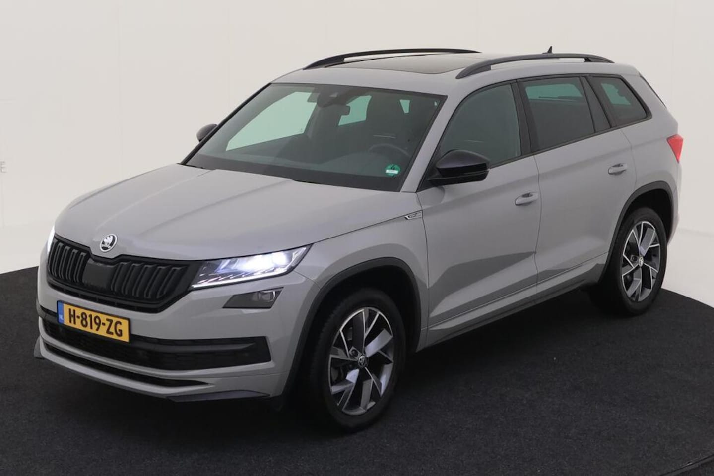 Skoda Kodiaq - 1.5 TSI Sportline Pano Virtual 7 Pers Trekhaak - AutoWereld.nl