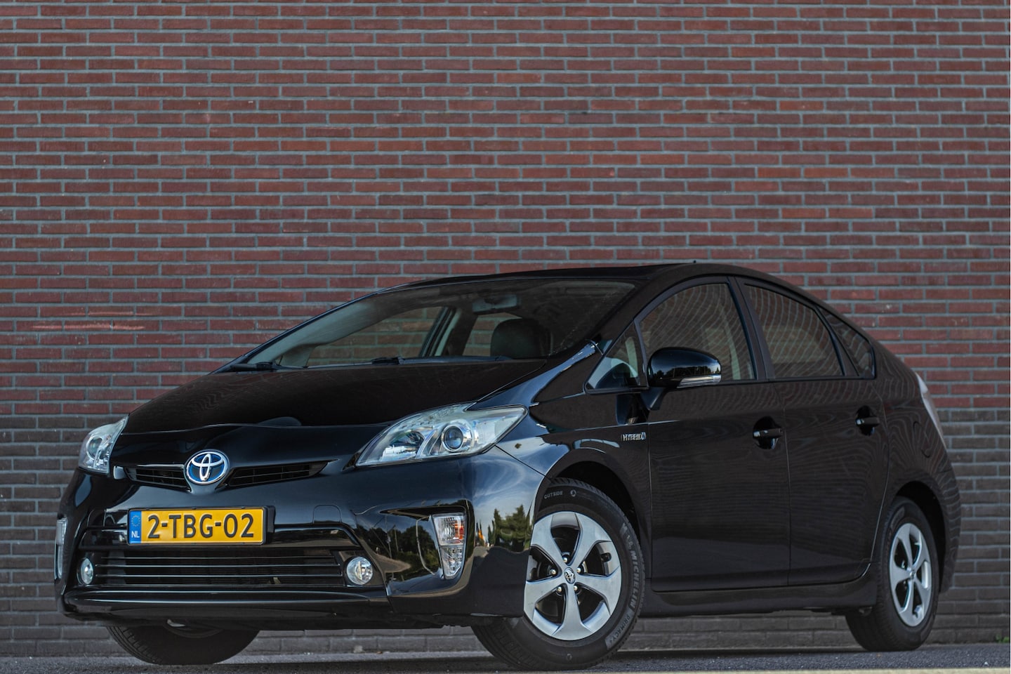 Toyota Prius - 1.8 Hybrid Business, Dealer onderhouden, Leder, Stoelverwarming, Navigatie, Head-up, Keyle - AutoWereld.nl
