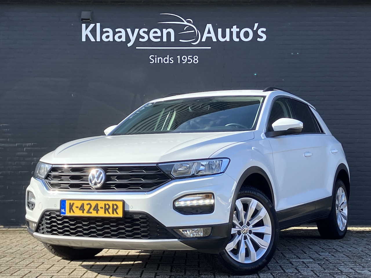 Volkswagen T-Roc - 1.5 TSI Sport 150 pk AUT. | apple carplay | adaptieve cruise | parkeersensoren | climate c - AutoWereld.nl